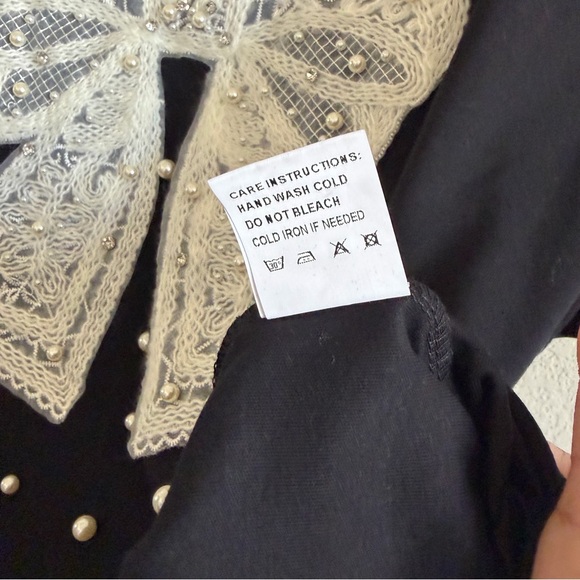 Lizette Collection woman’s Black chic T-Shirt with White Lace and Pearl Accents - Picture 4 of 8